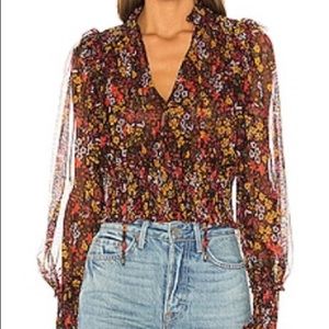 Free people floral pattern crop top.